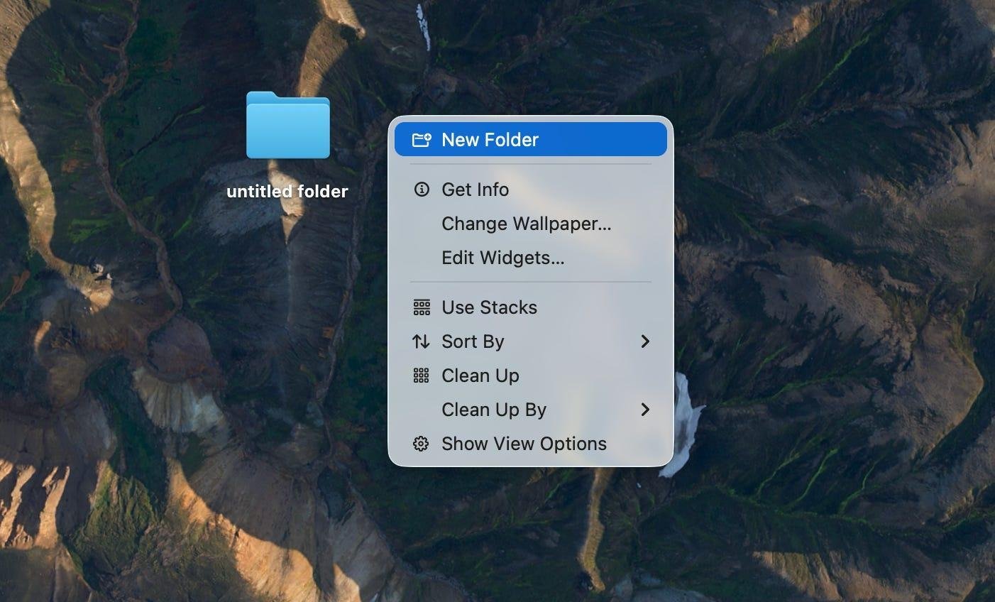 Ảnh minh hoạ thao tác chuột phải trên màn hình desktop và chọn New Folder để tạo thư mục mới
